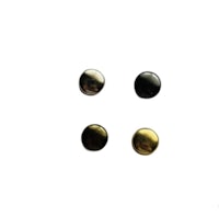 four black and gold studs on a white background